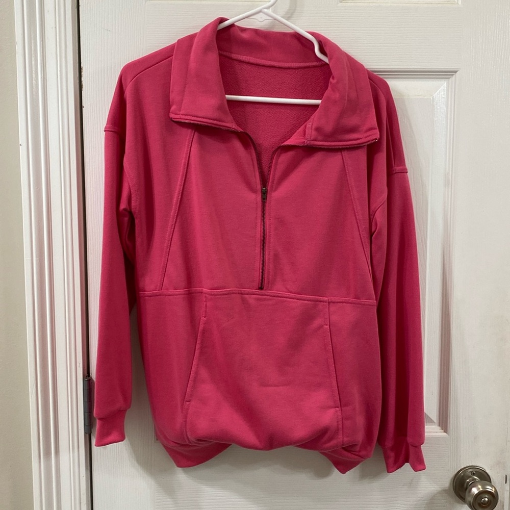 3/4 zip up pink sweat shirt.
